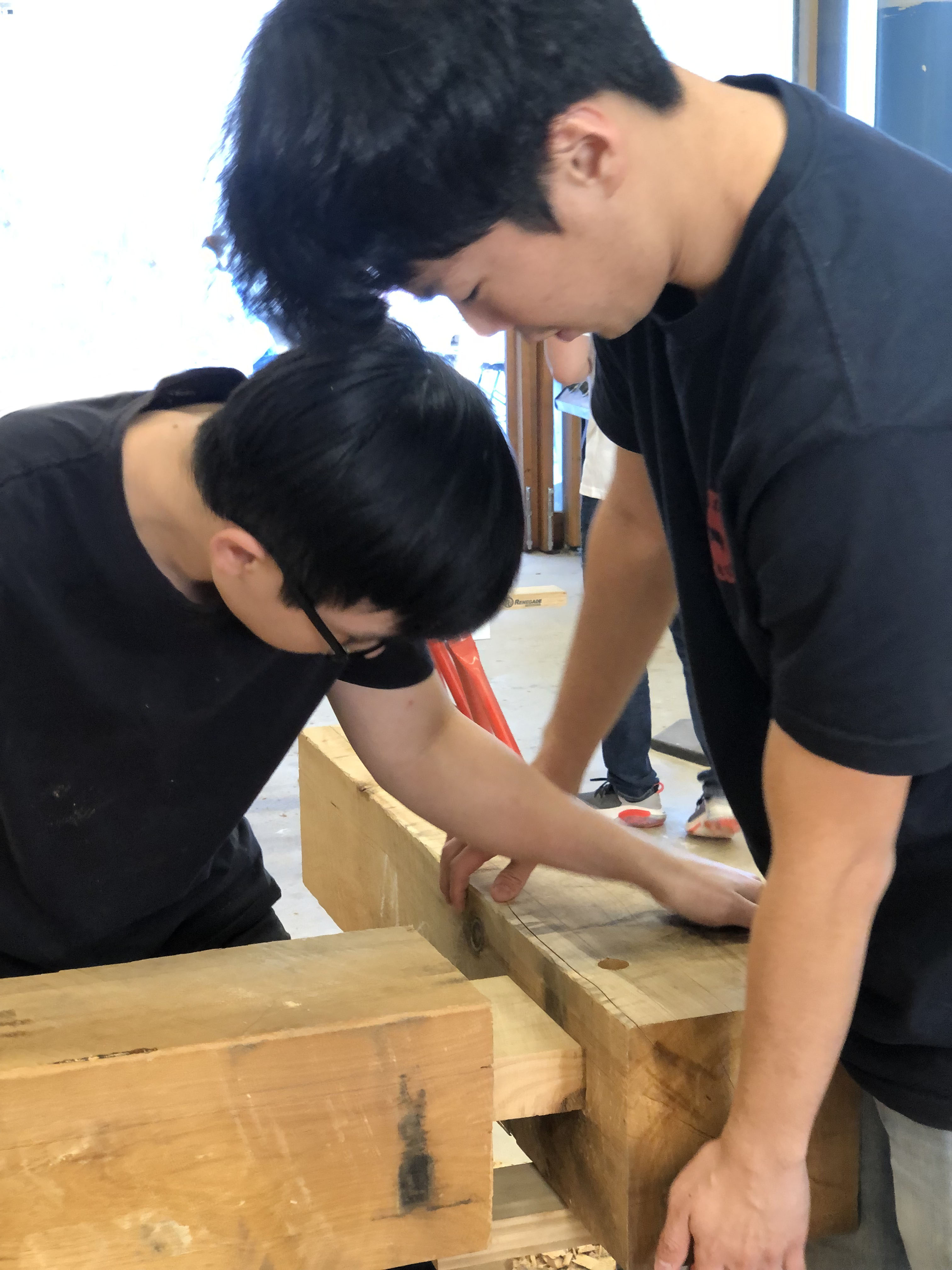 UQ students put together a mortice and tenon joint