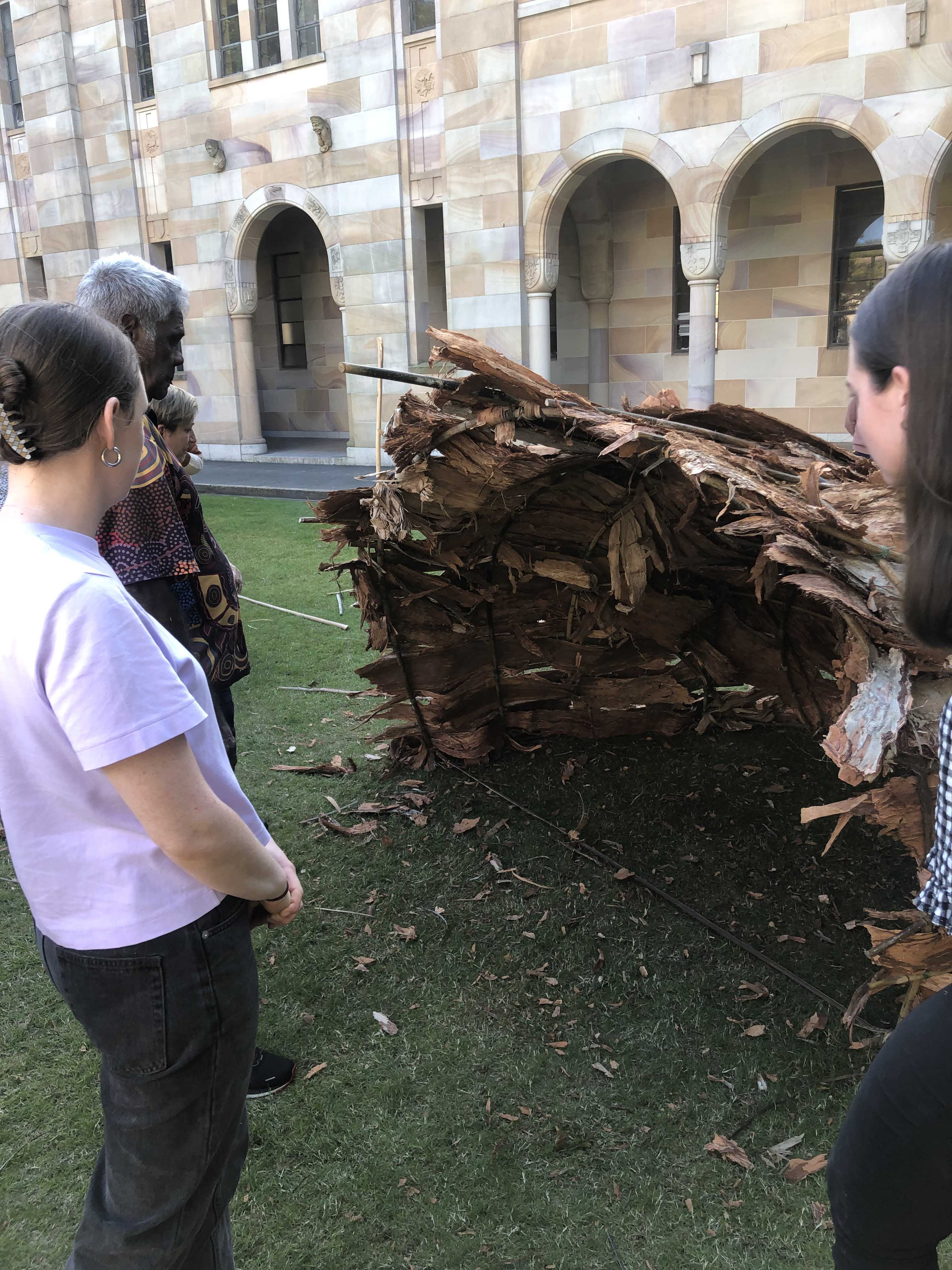 Students look at the completed bulmba in the UQ Great Court