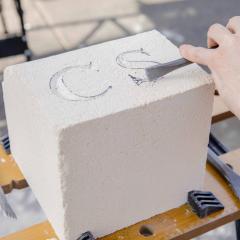 Mason's mark carving in to limestone