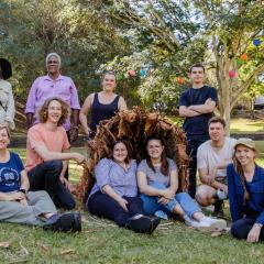 Students sitting in front of a Bulmba
