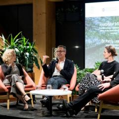 Panel members at event